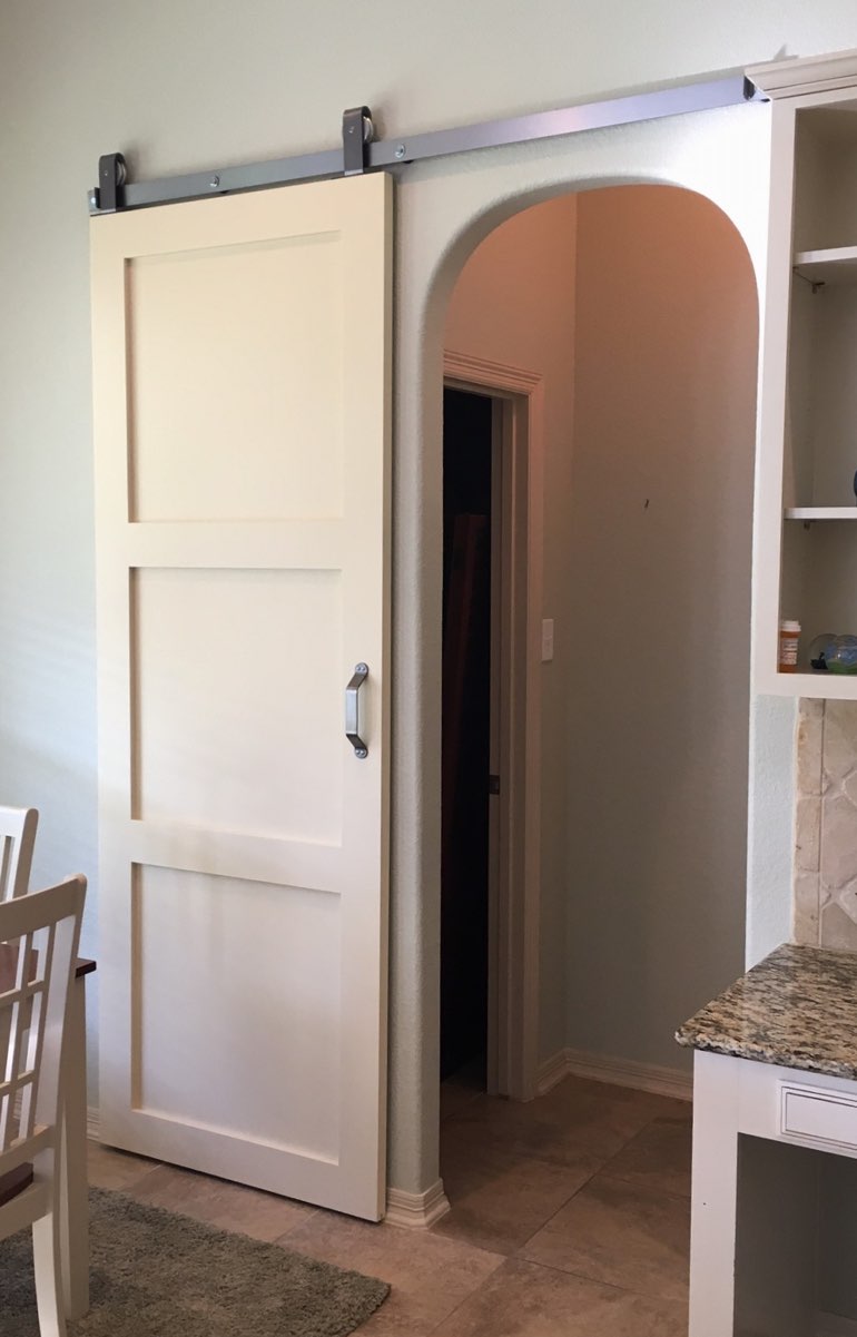 Quaker style barn door in Chicago kitchen.